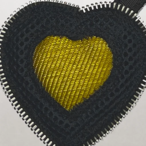 Zoomed product image of the yellow heart keyring.