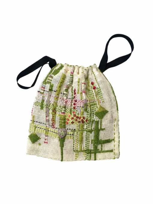 Hand-sewn drawstring bag with green stitching